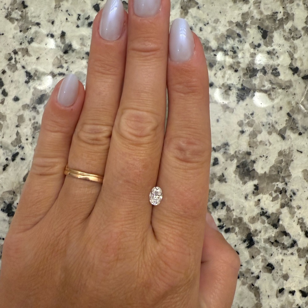 AUTHENTIC 6a colorless Moissanite .8 cts
